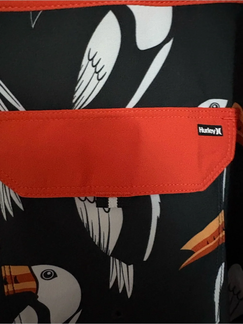 Hurley Men’s Black Toucan Board Shorts with Red Waistband and Orange Beaks